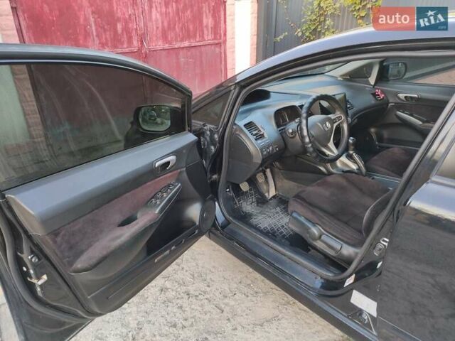 Черный Хонда Цивик, объемом двигателя 1.8 л и пробегом 239 тыс. км за 5500 $, фото 4 на Automoto.ua