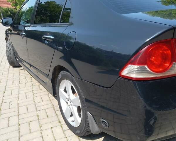 Черный Хонда Цивик, объемом двигателя 1.8 л и пробегом 274 тыс. км за 5000 $, фото 18 на Automoto.ua