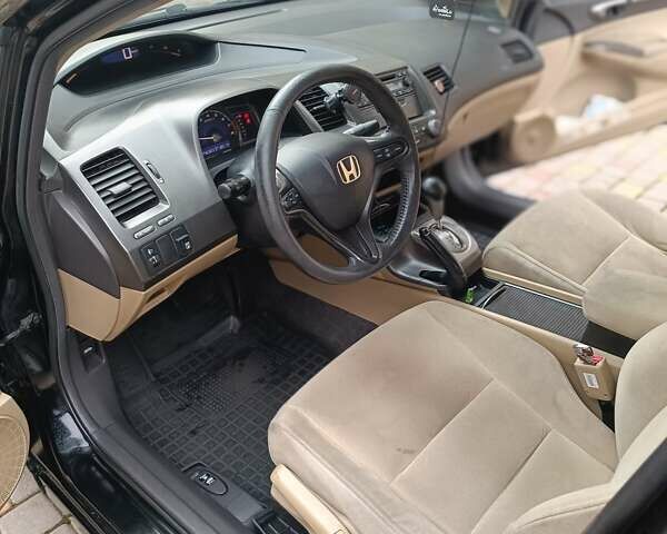 Черный Хонда Цивик, объемом двигателя 1.8 л и пробегом 246 тыс. км за 5950 $, фото 14 на Automoto.ua