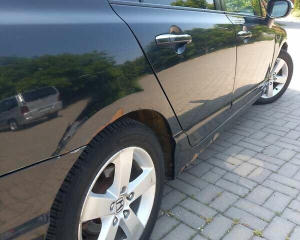 Черный Хонда Цивик, объемом двигателя 1.8 л и пробегом 274 тыс. км за 5000 $, фото 22 на Automoto.ua