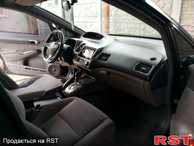 Черный Хонда Цивик, объемом двигателя 1.3 л и пробегом 280 тыс. км за 6250 $, фото 2 на Automoto.ua