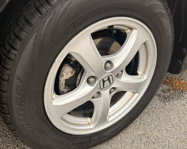 Черный Хонда Цивик, объемом двигателя 1.34 л и пробегом 162 тыс. км за 5550 $, фото 7 на Automoto.ua