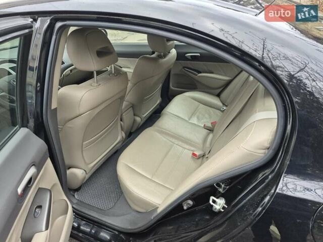 Черный Хонда Цивик, объемом двигателя 1.34 л и пробегом 257 тыс. км за 6500 $, фото 5 на Automoto.ua