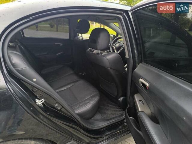 Чорний Хонда Сівік, об'ємом двигуна 1.34 л та пробігом 310 тис. км за 6999 $, фото 4 на Automoto.ua