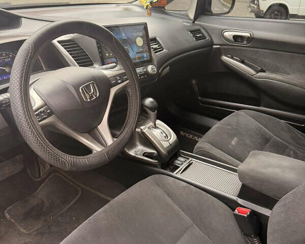 Черный Хонда Цивик, объемом двигателя 1.34 л и пробегом 162 тыс. км за 5550 $, фото 6 на Automoto.ua
