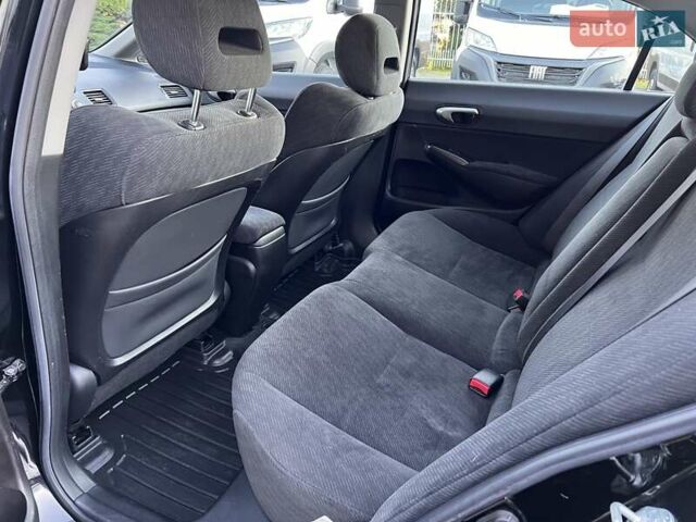 Черный Хонда Цивик, объемом двигателя 1.3 л и пробегом 297 тыс. км за 7999 $, фото 29 на Automoto.ua