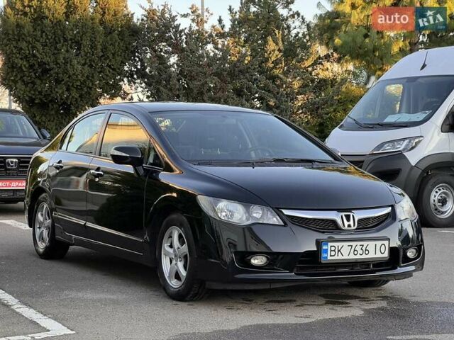 Черный Хонда Цивик, объемом двигателя 1.3 л и пробегом 297 тыс. км за 7999 $, фото 6 на Automoto.ua