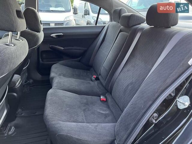 Черный Хонда Цивик, объемом двигателя 1.3 л и пробегом 297 тыс. км за 7999 $, фото 31 на Automoto.ua