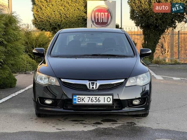 Черный Хонда Цивик, объемом двигателя 1.3 л и пробегом 297 тыс. км за 7999 $, фото 3 на Automoto.ua