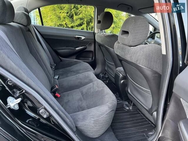 Черный Хонда Цивик, объемом двигателя 1.3 л и пробегом 297 тыс. км за 7999 $, фото 25 на Automoto.ua