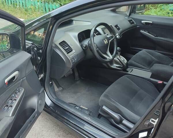 Черный Хонда Цивик, объемом двигателя 1.34 л и пробегом 158 тыс. км за 9400 $, фото 4 на Automoto.ua