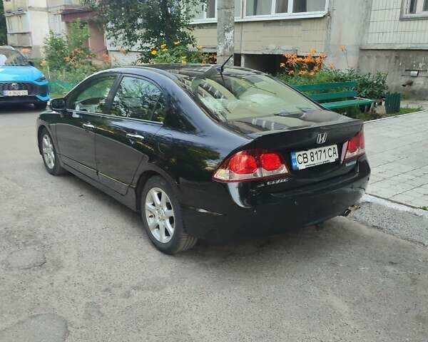Черный Хонда Цивик, объемом двигателя 1.34 л и пробегом 158 тыс. км за 9400 $, фото 6 на Automoto.ua