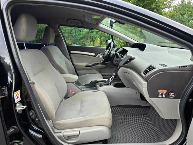 Хонда Цивик 2012 в Хмельницком на Automoto.ua Черный Хонда Цивик, объемом двигателя 1.8 л и пробегом 172 тыс. км за 9999 $, фото 10 на Automoto.ua
