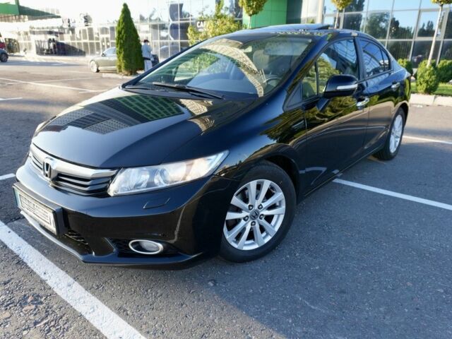Чорний Хонда Сівік, об'ємом двигуна 1.8 л та пробігом 220 тис. км за 9650 $, фото 5 на Automoto.ua