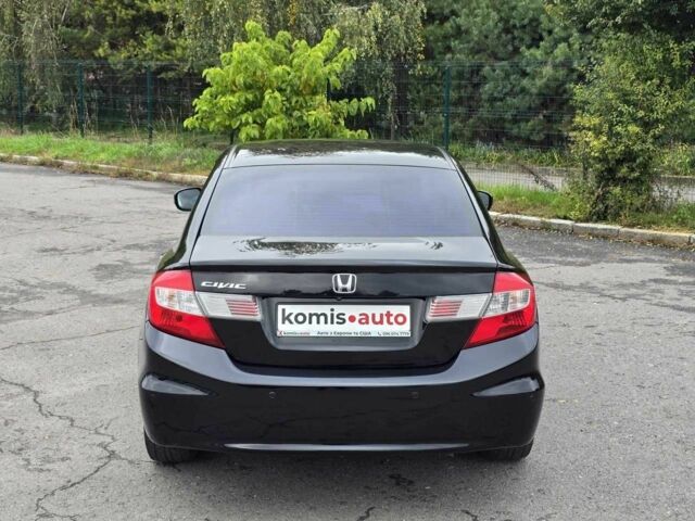 Хонда Цивик 2012 в Хмельницком на Automoto.ua Черный Хонда Цивик, объемом двигателя 1.8 л и пробегом 172 тыс. км за 9999 $, фото 6 на Automoto.ua
