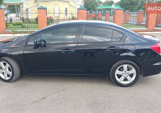 Черный Хонда Цивик, объемом двигателя 1.8 л и пробегом 76 тыс. км за 9200 $, фото 3 на Automoto.ua