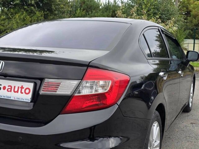 Хонда Цивик 2012 в Хмельницком на Automoto.ua Черный Хонда Цивик, объемом двигателя 1.8 л и пробегом 172 тыс. км за 9999 $, фото 5 на Automoto.ua
