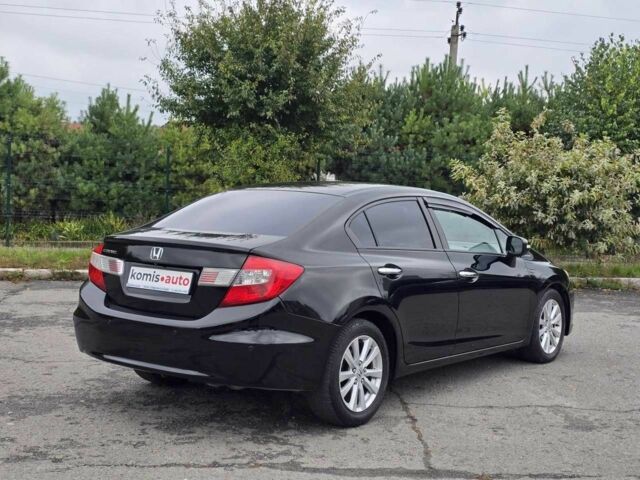 Хонда Цивик 2012 в Хмельницком на Automoto.ua Черный Хонда Цивик, объемом двигателя 1.8 л и пробегом 172 тыс. км за 9999 $, фото 2 на Automoto.ua