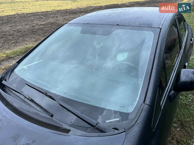 Чорний Хонда Сівік, об'ємом двигуна 1.8 л та пробігом 323 тис. км за 6888 $, фото 4 на Automoto.ua