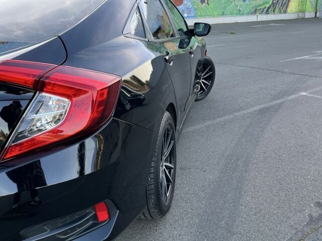 Черный Хонда Цивик, объемом двигателя 2 л и пробегом 129 тыс. км за 12300 $, фото 5 на Automoto.ua