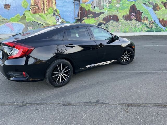 Черный Хонда Цивик, объемом двигателя 2 л и пробегом 129 тыс. км за 12300 $, фото 4 на Automoto.ua