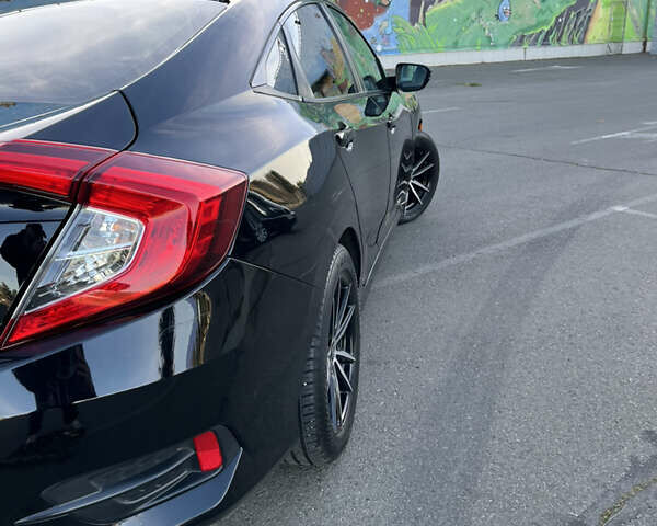 Черный Хонда Цивик, объемом двигателя 2 л и пробегом 129 тыс. км за 12300 $, фото 5 на Automoto.ua