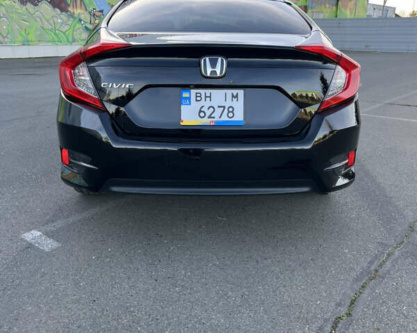 Черный Хонда Цивик, объемом двигателя 2 л и пробегом 129 тыс. км за 12300 $, фото 7 на Automoto.ua