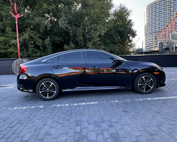 Черный Хонда Цивик, объемом двигателя 2 л и пробегом 116 тыс. км за 13500 $, фото 5 на Automoto.ua