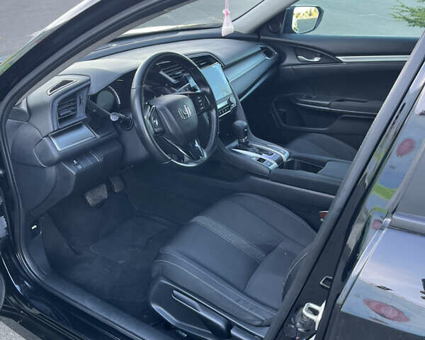 Черный Хонда Цивик, объемом двигателя 2 л и пробегом 129 тыс. км за 12300 $, фото 10 на Automoto.ua