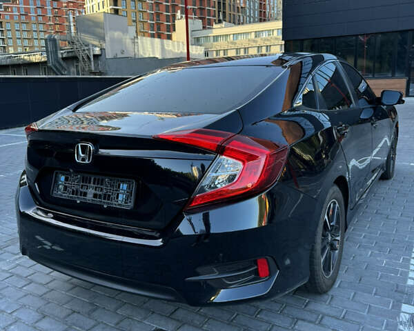 Черный Хонда Цивик, объемом двигателя 2 л и пробегом 116 тыс. км за 13500 $, фото 4 на Automoto.ua