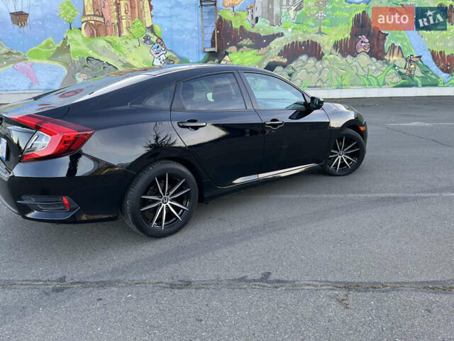 Черный Хонда Цивик, объемом двигателя 2 л и пробегом 129 тыс. км за 12300 $, фото 4 на Automoto.ua