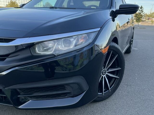 Черный Хонда Цивик, объемом двигателя 2 л и пробегом 129 тыс. км за 12300 $, фото 2 на Automoto.ua