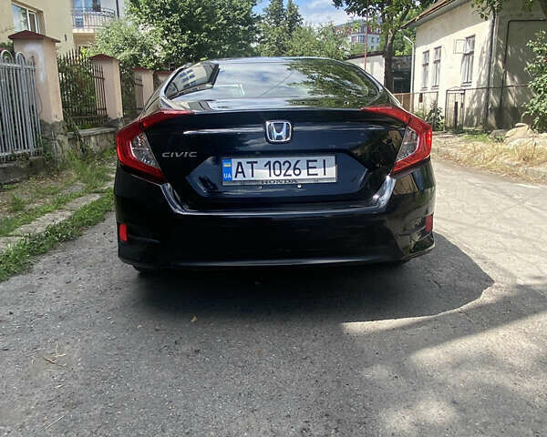 Чорний Хонда Сівік, об'ємом двигуна 2 л та пробігом 75 тис. км за 16000 $, фото 2 на Automoto.ua