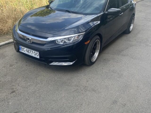 Черный Хонда Цивик, объемом двигателя 2 л и пробегом 85 тыс. км за 12500 $, фото 2 на Automoto.ua