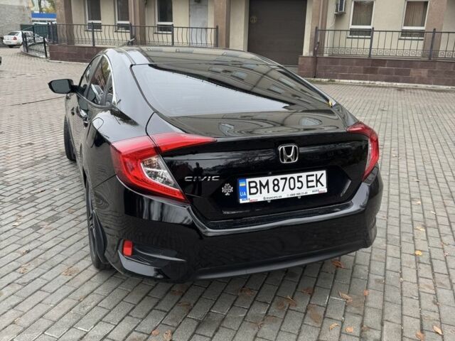 Черный Хонда Цивик, объемом двигателя 2 л и пробегом 140 тыс. км за 14000 $, фото 1 на Automoto.ua