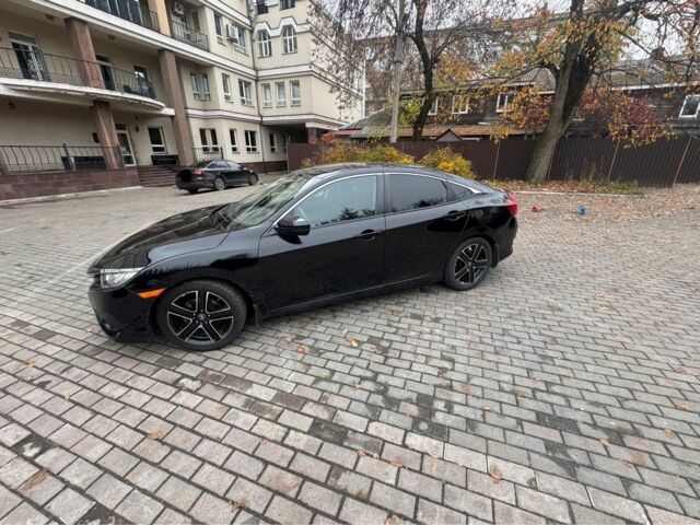 Черный Хонда Цивик, объемом двигателя 2 л и пробегом 140 тыс. км за 14000 $, фото 5 на Automoto.ua