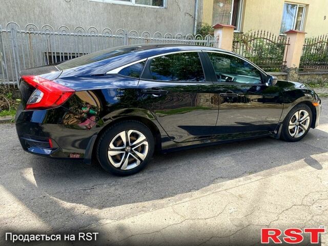 Чорний Хонда Сівік, об'ємом двигуна 2 л та пробігом 75 тис. км за 16000 $, фото 5 на Automoto.ua