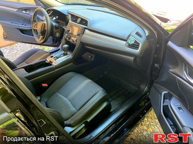 Чорний Хонда Сівік, об'ємом двигуна 2 л та пробігом 75 тис. км за 16000 $, фото 2 на Automoto.ua