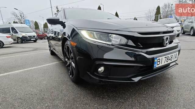 Чорний Хонда Сівік, об'ємом двигуна 2 л та пробігом 81 тис. км за 14500 $, фото 2 на Automoto.ua