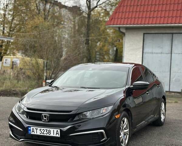 Чорний Хонда Сівік, об'ємом двигуна 2 л та пробігом 92 тис. км за 14800 $, фото 19 на Automoto.ua