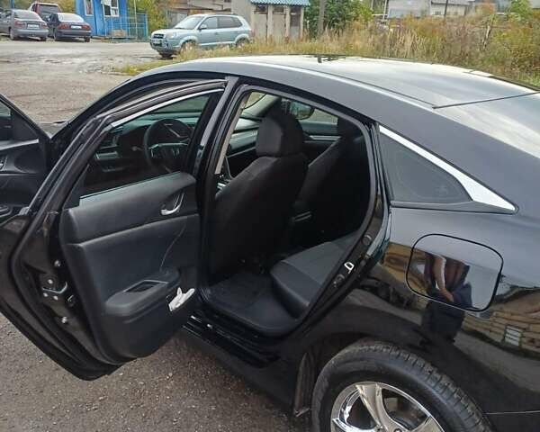 Чорний Хонда Сівік, об'ємом двигуна 2 л та пробігом 92 тис. км за 14800 $, фото 51 на Automoto.ua