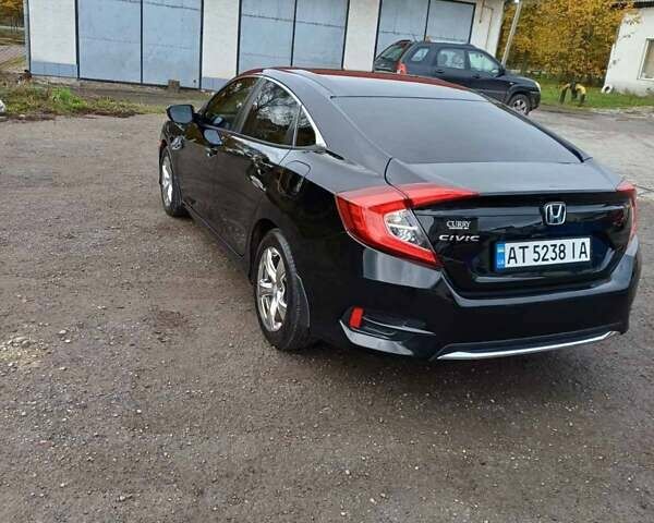 Чорний Хонда Сівік, об'ємом двигуна 2 л та пробігом 92 тис. км за 14800 $, фото 55 на Automoto.ua