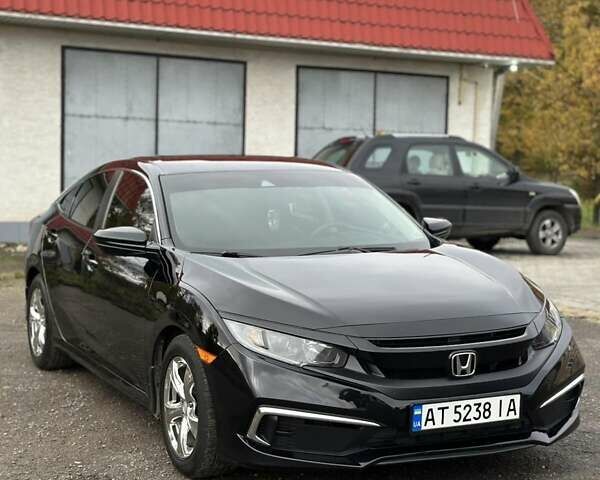 Чорний Хонда Сівік, об'ємом двигуна 2 л та пробігом 92 тис. км за 14800 $, фото 65 на Automoto.ua