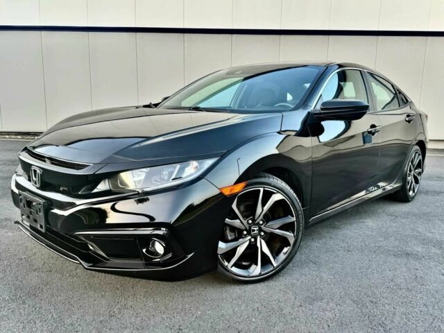 Черный Хонда Цивик, объемом двигателя 2 л и пробегом 15 тыс. км за 8000 $, фото 2 на Automoto.ua