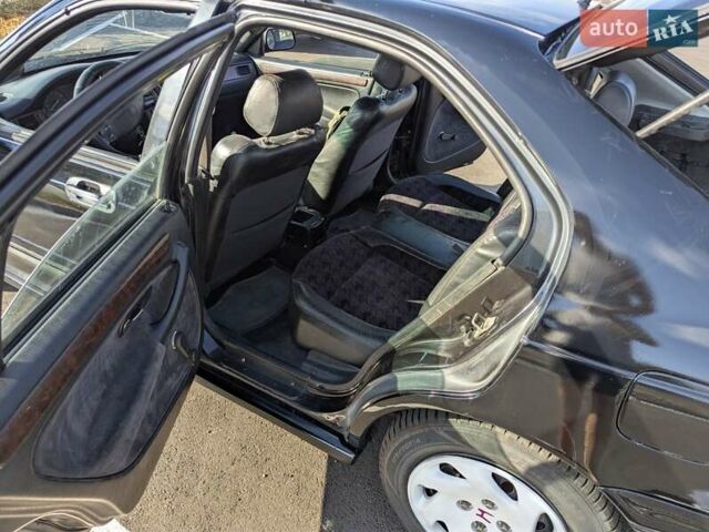 Черный Хонда Цивик, объемом двигателя 1.4 л и пробегом 370 тыс. км за 2000 $, фото 12 на Automoto.ua