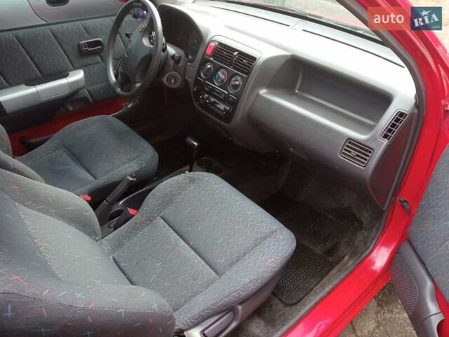 Красный Хонда Цивик, объемом двигателя 1.34 л и пробегом 117 тыс. км за 4150 $, фото 7 на Automoto.ua