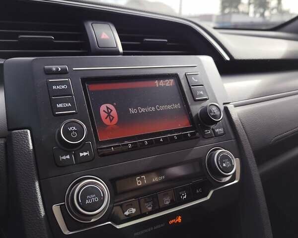 Червоний Хонда Сівік, об'ємом двигуна 2 л та пробігом 87 тис. км за 14900 $, фото 25 на Automoto.ua