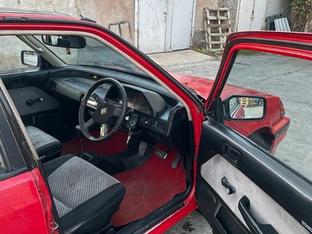 Красный Хонда Цивик, объемом двигателя 1.5 л и пробегом 220 тыс. км за 1500 $, фото 5 на Automoto.ua