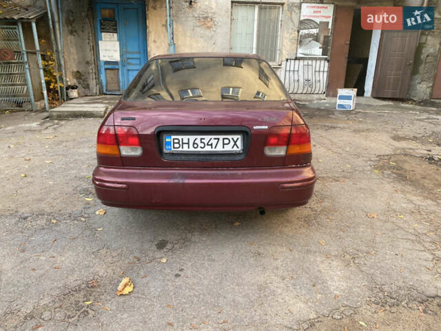 Красный Хонда Цивик, объемом двигателя 1.4 л и пробегом 390 тыс. км за 3400 $, фото 5 на Automoto.ua