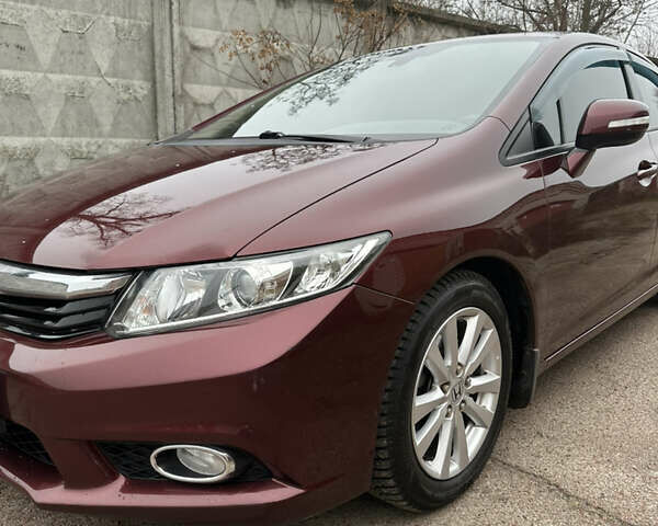 Красный Хонда Цивик, объемом двигателя 1.8 л и пробегом 100 тыс. км за 11500 $, фото 2 на Automoto.ua